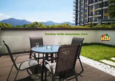 a table and chairs with wine glasses on a patio at H2H - CY7 @ Majestic Ipoh in Ipoh