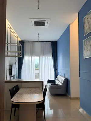 a living room with a couch and a table at H2H - CY7 @ Majestic Ipoh in Ipoh