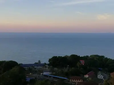 a view of the ocean from a hill at InvincibleSeaview Batu Ferrighi Sri Sayang \u7121\u6575\u6d77\u666f 2-7 in Batu Ferringhi