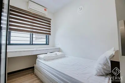 a small bedroom with a bed and a window at Ipoh Mansion House 21 by Verve (14pax) EECH74 in Ipoh