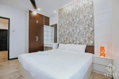 a bedroom with a large white bed in a room at Ipoh Mansion House 21 by Verve (14pax) EECH74 in Ipoh
