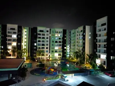 a view of a city at night with tall buildings at Razads Waterpark Homestay Ipoh in Ipoh