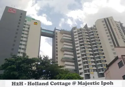 a group of tall buildings in a city at H2H - Holland Cottage - Majestic Ipoh - 7pax in Ipoh