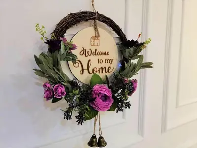 a wreath with a welcome to my home sign on a door at \u5317\u6b27ING\u98ce\u683c\u8c6a\u534e\u65e5\u51fa\u6d77\u666f\u5957\u623f Nordic ING Luxury Seaview Suite in Tanjong Tokong