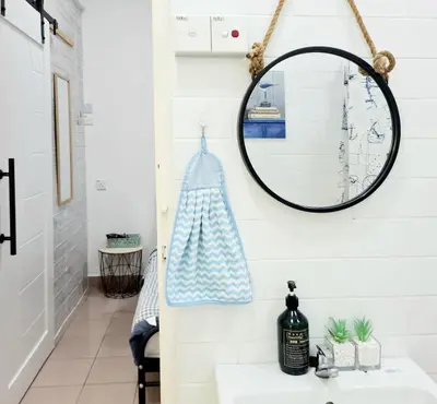 a bathroom with a mirror and a sink at 527 BeachHouse l 5 bedroom with swimming pool - 3min walk to the beach in Tanjung Bungah