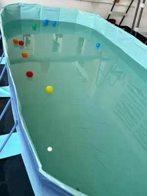 a pool table with colorful balls on it at Ssue Klebang Ipoh Homestay With Complementary Pool & High Speed internet WIFI in Chemor