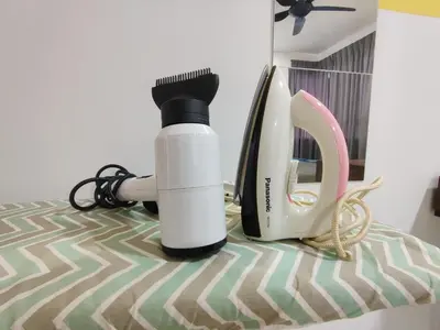 a hair dryer and a blow dryer and a telephone at KT's Homestay- Corner Unit - Manhattan Ipoh Water Park- Station 18 in Ipoh