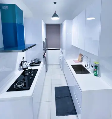 a white kitchen with a sink and a stove at #12Georgetown Luxury Suite with Rooftop Pool in George Town