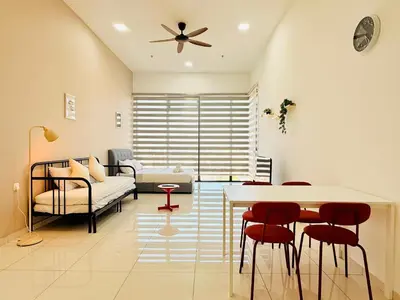 a living room with a ceiling fan and a table and chairs at New 2BR Georgetown Warm and Lovely Homestay 10pax-\u65e0\u654c\u7f8e\u666f\u4e24\u623f\u6c11\u5bbf Beacon Executive Suite in George Town