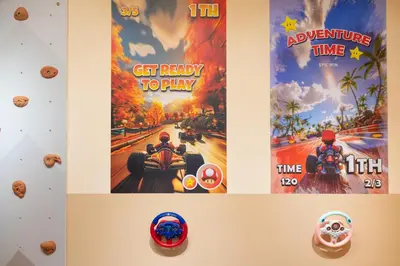 a wall with two posters of movies at Fantasy Funland Retreat by The Only Bnb in Tanjong Tokong