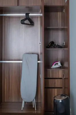 a closet with a white chair in a room at Fantasy Funland Retreat by The Only Bnb in Tanjong Tokong