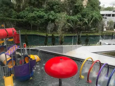 a playground in a park with a water slide at Ipoh The Cove Elegant Homestay Tambun in Ipoh