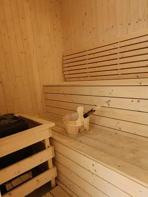 a sauna with a tub and a knife in it at Ipoh The Cove Elegant Homestay Tambun in Ipoh