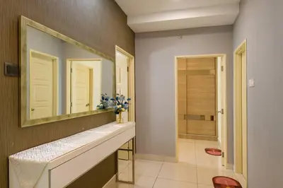 a bathroom with a sink and a mirror at 2R2B/Cosy House/1~8pax/Gurney/Mansion One in George Town
