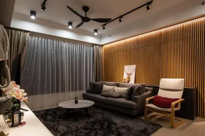 a living room with a couch and a table at Executive Seaview 2Bedrooms Macalister Georgetown 4-6pax in George Town