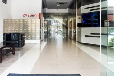 a lobby of a store with a glass door at Octagon Premium Ipoh Town Center 2BR 101 by Grab A Stay in Ipoh