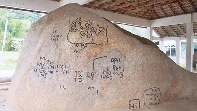 a rock with writing on the side of it at Pangkor Better Life Cozy Studio-walking 2min to beach,1-4pax in Pangkor