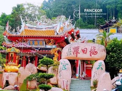 a building with a building with writing on it at Pangkor Better Life Cozy Studio-walking 2min to beach,1-4pax in Pangkor