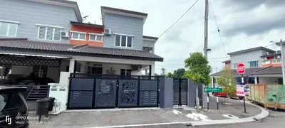 a house with a black gate and a stop sign at Rania Homestay With Private Pool Seri Iskandar Perak Near UTP UITM in Kampong Bota Road