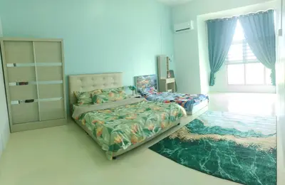a bedroom with a bed and a window at Homestay Muslim in Kuala Ketil