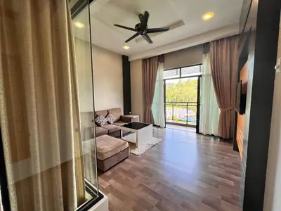 a living room with a couch and a ceiling fan at Hotel Studio Apartment- Fantastic Mountain View (4pax) in Brinchang