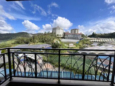 a view of a city from a balcony at Hotel Studio Apartment- Fantastic Mountain View (4pax) in Brinchang