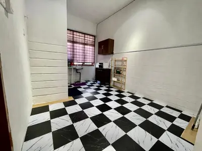 an empty room with a black and white checkered floor at Cozy 10 Entire House 4 Bedroom At Alma Bukit Mertajam in Bukit Mertajam