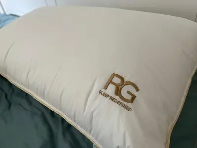 a white pillow with the rcp logo on it at By The Sea Beachfront Designer Suites Penang - Managed by Art of Tree in Batu Ferringhi