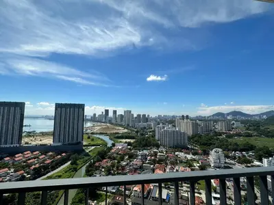 a view of a city from a balcony at LM HomeyA 3 BdRm Coastline View condo for 4-14 Pax with Netflix & Coway Water Purifier in Tanjong Tokong