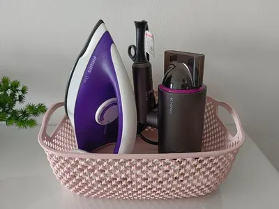 a pink basket with some items in it at LM HomeyA 3 BdRm Coastline View condo for 4-14 Pax with Netflix & Coway Water Purifier in Tanjong Tokong