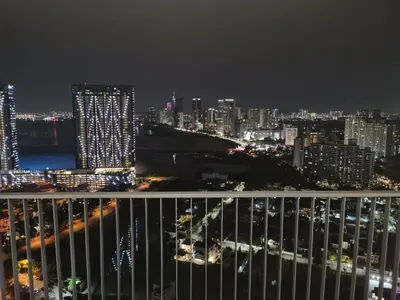a view of a city skyline at night at LM HomeyA 3 BdRm Coastline View condo for 4-14 Pax with Netflix & Coway Water Purifier in Tanjong Tokong