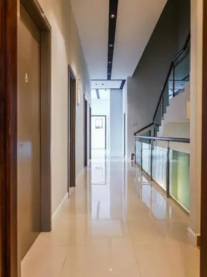 an empty hallway with stairs in a building at Joyful Guesthouse#IslandHosp in George Town