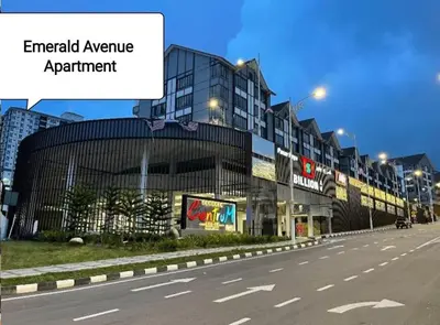an empty street in front of a large building at SA @ Cameron Emerald Avenue in Brinchang