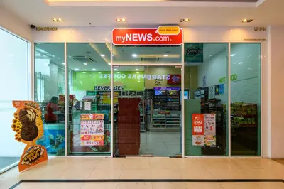 a store with a sign in the front of it at 2R1B/Seaview Garden/1~8pax/Gurney/Mansion One in George Town