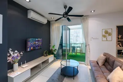 a living room with a couch and a ceiling fan at 2R1B/Seaview Garden/1~8pax/Gurney/Mansion One in George Town
