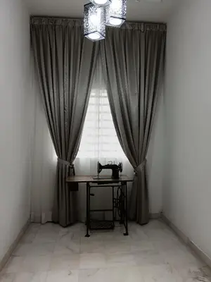 a room with a table in front of a window at Grey Fantasy Homes#Sunway Water Theme Park in Ipoh