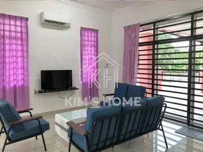 a living room with two chairs and a table at Kim’s Home - Homey At Your Stay in Nibung Tebal