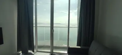 a view of the ocean from a hotel room window at Infinite Seaview with Penang Bridge Suite with Sunrise up to 11 person in Bayan Lepas