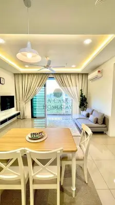 a dining table and chairs in a living room at A' Casa Homestay Ipoh Perak in Ipoh