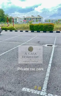 a parking lot with a car park sign on it at A' Casa Homestay Ipoh Perak in Ipoh