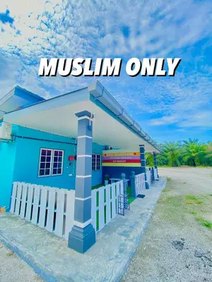 a blue building with a sign that reads museum only at AISY HOMESTAY - Rumah 4 atau 5 in Kampong Tanjong Karang