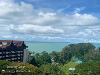 a view of the ocean from a building at Happy Home 10 Sri Sayang Batu Ferringhi in Batu Ferringhi