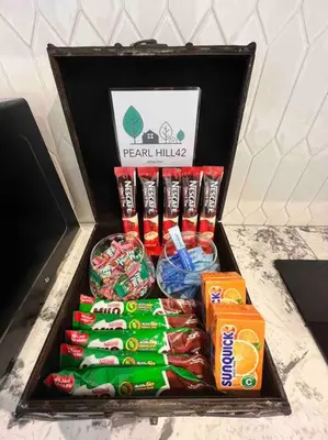 a black box filled with different types of candy at Tanjung Bungah PEARL HILL42 Homestay in Tanjung Bungah