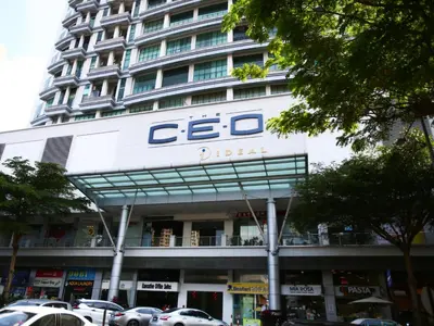 a building with a sign on the front of it at Private Tree House - Cinema at CEO Bayan Lepas Penang in Bayan Lepas