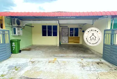a small house with a garage and a driveway at Aimima Muslim Homestay @ Lost World Of Tambun. in Kampong Batu Lapan