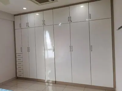 a large white closet with white cabinets in a room at SUMMERSET 8PAX 3BR LUXURY SEAVIEW SUITE ROOM in George Town