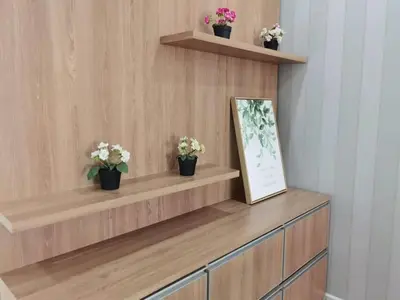 a shelf with three potted plants on top of it at SUMMERSET 8PAX 3BR LUXURY SEAVIEW SUITE ROOM in George Town