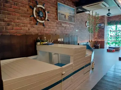 a bar in a room with a brick wall at Sekinchan PaddyCruise Homestay Wifi in Sekincan