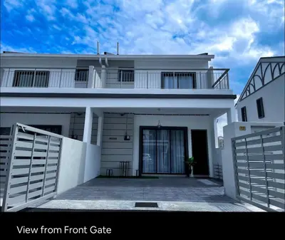 a view from front gate of a white house at New 2 storey-Majestic Homestay 3 min to Night Market in Brinchang