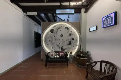 a room with a fake moon on the wall at Carnarvon Heritage Lodge in George Town
